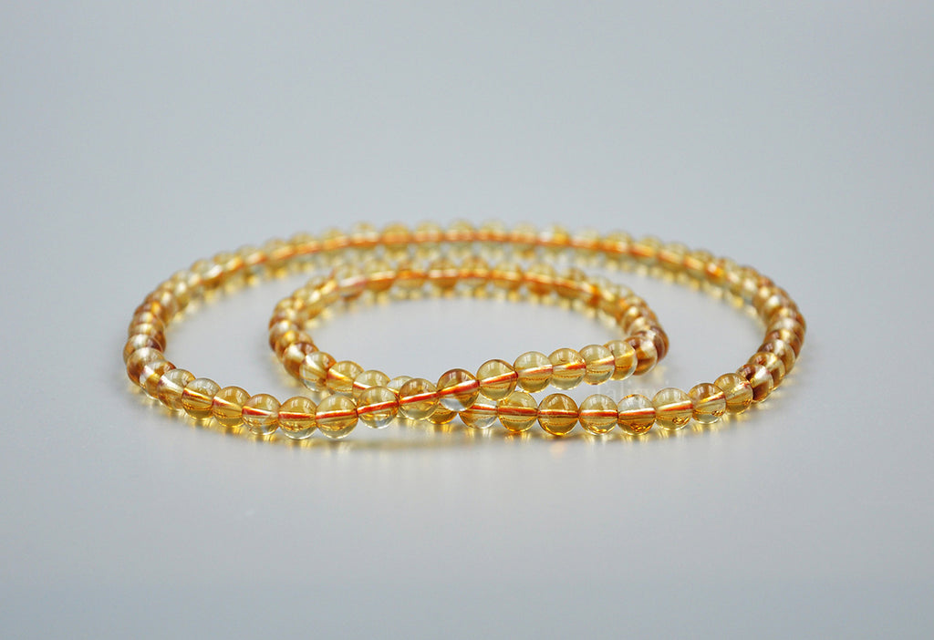 Triple-Wrap Yellow Quartz Bracelet – 6mm Beads · Layered Golden Shine